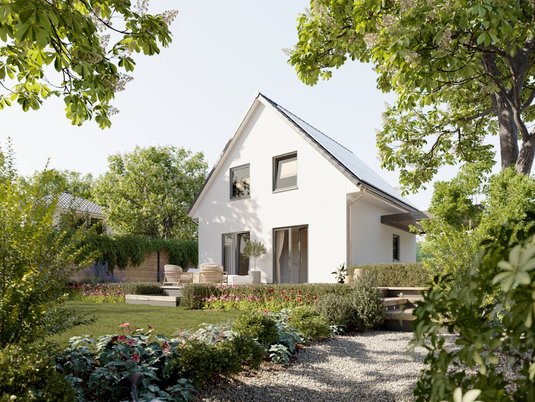 Raumwunder 90 mit kompakter Grundfläche Kompaktes Haus mit Gartenblick und großer Fensterfront als Symbol für Wohnflächenberechnung und Wärmeschutznachweis