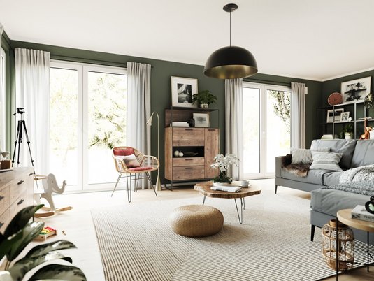Wohnzimmer im Massivhaus Flair 152 RE Helles Wohnzimmer im Massivhaus Flair 152 RE mit großen Fenstern und moderner Einrichtung. Ideal für energieeffizientes und komfortables Wohnen.