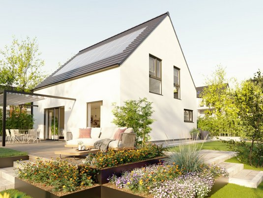 Ein modernes Einfamilienhaus mit Terrasse das zeigt wie wichtig klare Wege und Leitungsrechte für eine sichere Erschließung und gute Nachbarschaft in NRW sind