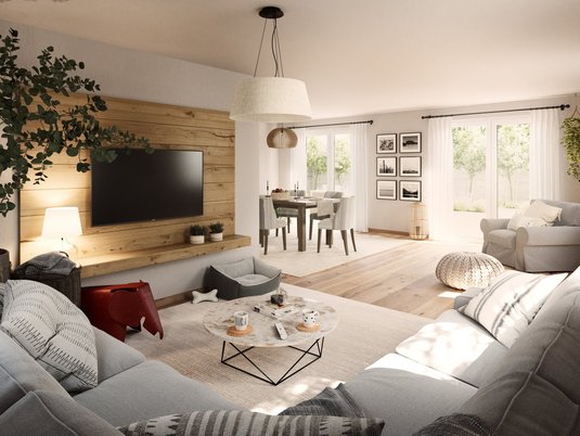 Großzügiger Wohnraum mit moderner Einrichtung und Fensterfront schafft Wohlfühlatmosphäre im Eigenheim