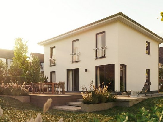 Stadthaus Flair 152 in Gartenansicht. Urbanes Massivhaus mit energieeffizienter Bauweise für modernes Familienleben.